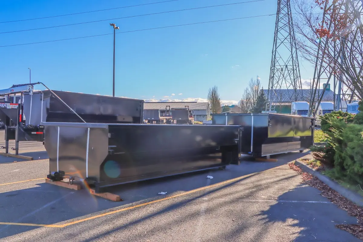Roll-off dumpster ready for waste disposal at job site for Construction Dumpster Rental in Center Point